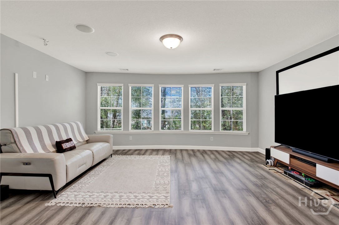 Bonus Room with Curved Wall of Windows and Pre-Wired Media Setup