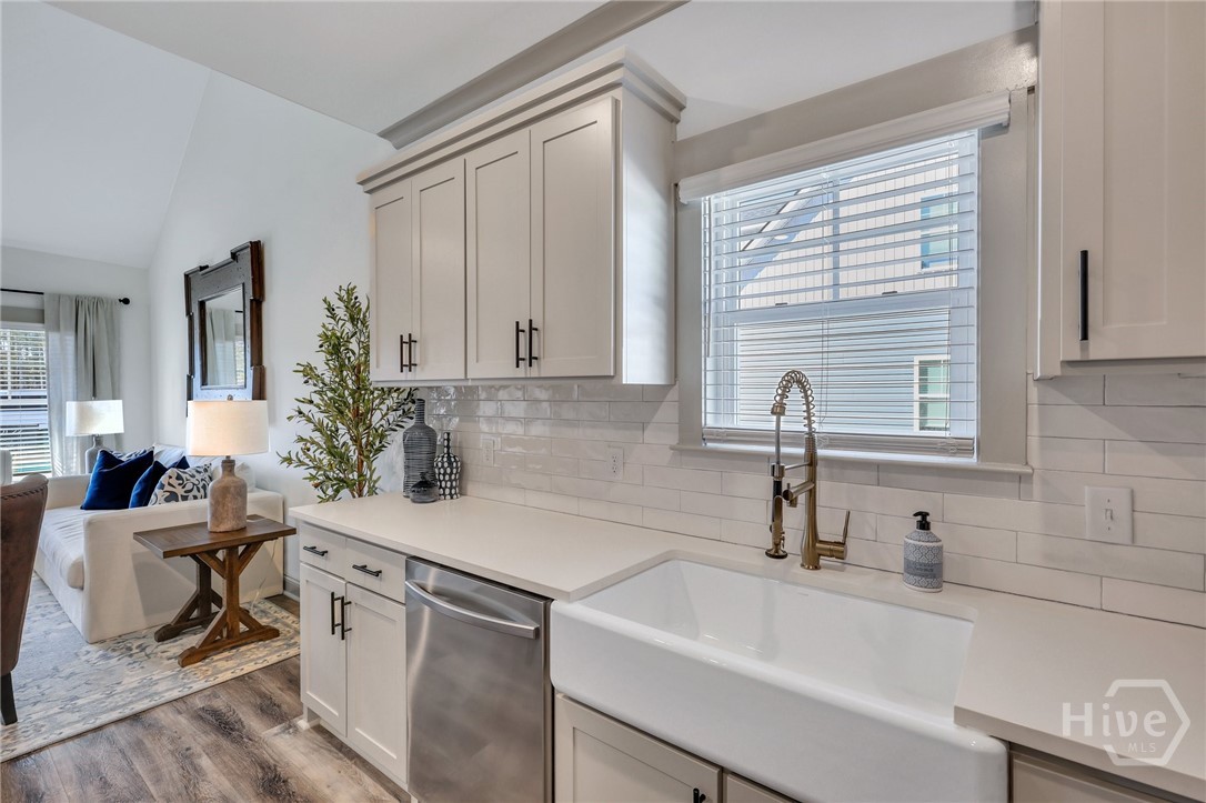 PHOTOS OF A PREVIOUSLY BUILT BRINSON PLAN BY LAWRENCE ALEXANDER HOMES.