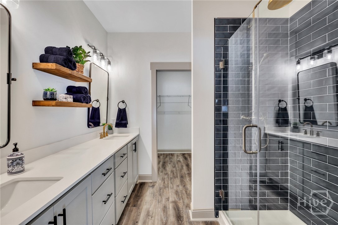 PHOTOS OF A PREVIOUSLY BUILT BRINSON PLAN BY LAWRENCE ALEXANDER HOMES.