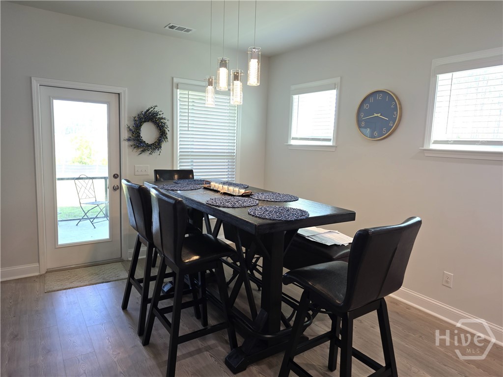 Breakfast area leads to Screened Porch