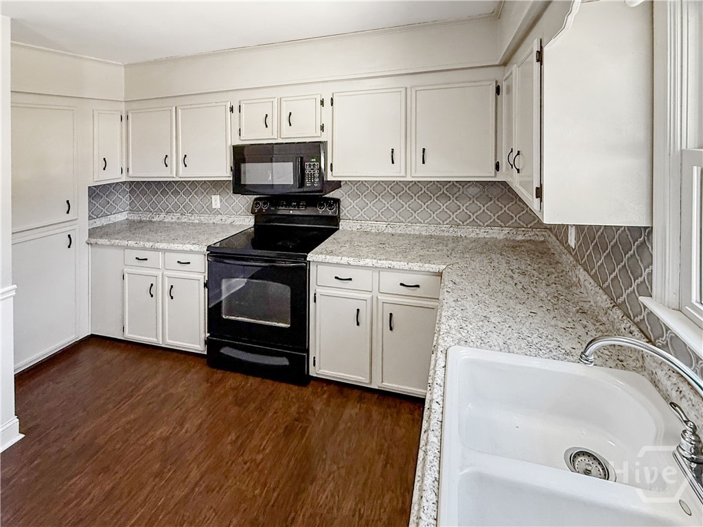 Eat-In Kitchen with lots of cabinets and counter s