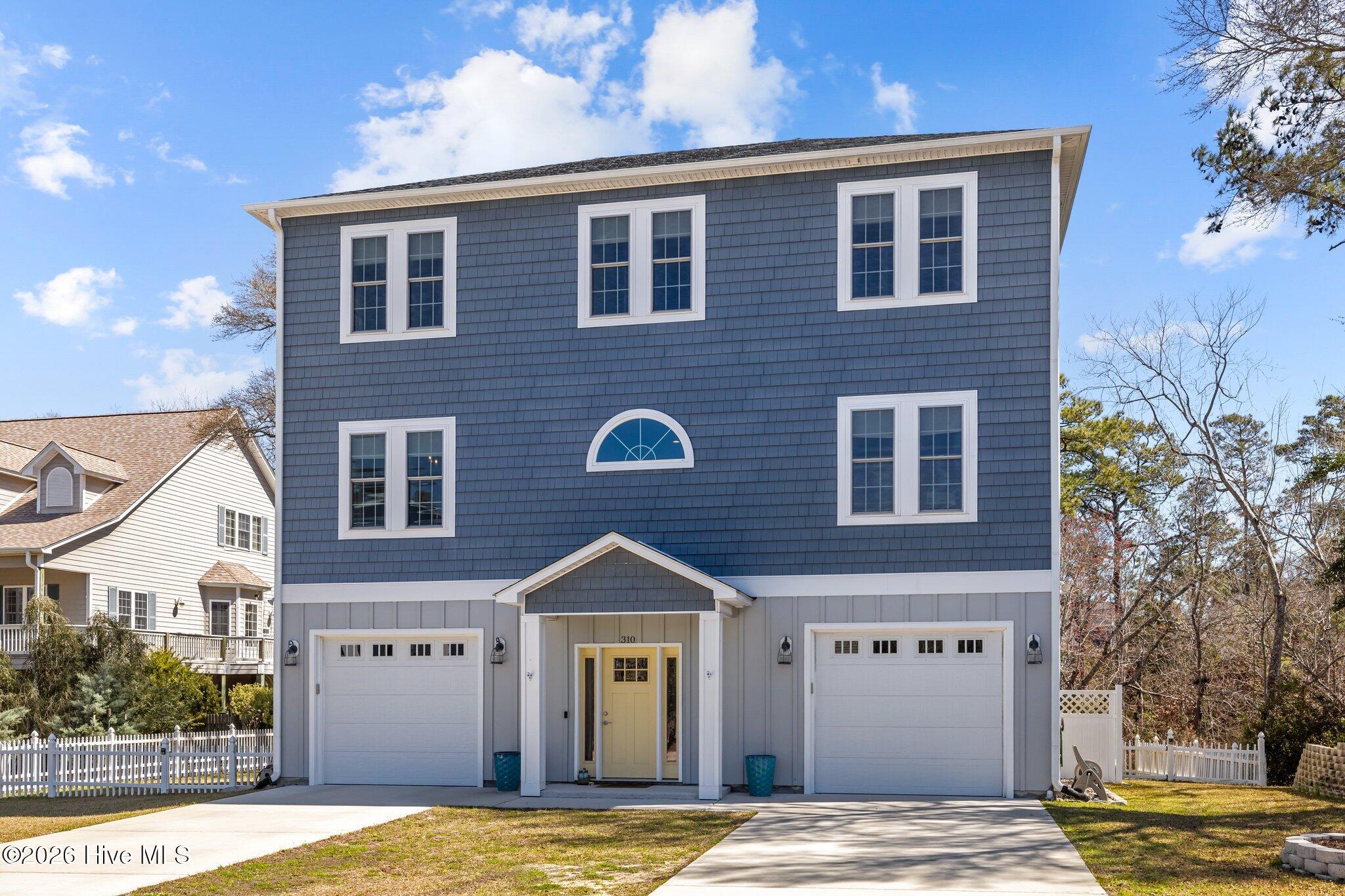 3 level home with double oversized garages