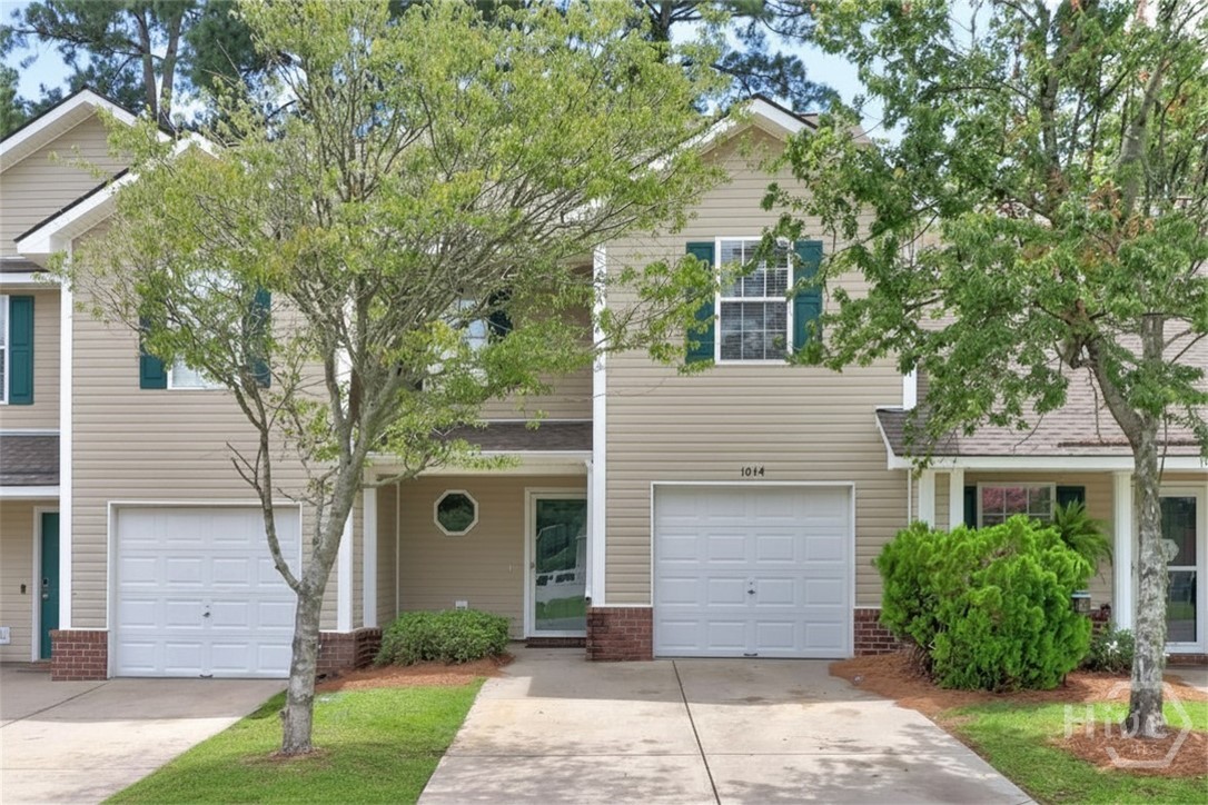 Spacious 3 bedroom, 2.5 bath townhome featuring a single car garage and inviting foyer entry. Freshly updated throughout, this home offers all new interior paint, freshly painted cabinets with updated hardware, brand new stainless steel appliances, new vinyl flooring downstairs, and new carpet throughout the upstairs. The open concept living and dining areas provide plenty of space for entertaining, while the kitchen features a refrigerator, dishwasher, stove, pantry, and convenient breakfast bar. Upstairs, you’ll find all three bedrooms along with the laundry room equipped with washer and dryer hookups. Step outside to enjoy the private fenced courtyard complete with an extended patio and a small covered porch which is perfect for relaxing or outdoor dining. Residents also enjoy access to community amenities including a swimming pool, all within a highly desirable school district. These recent updates give the home a fresh, modern feel and make it truly move-in ready.