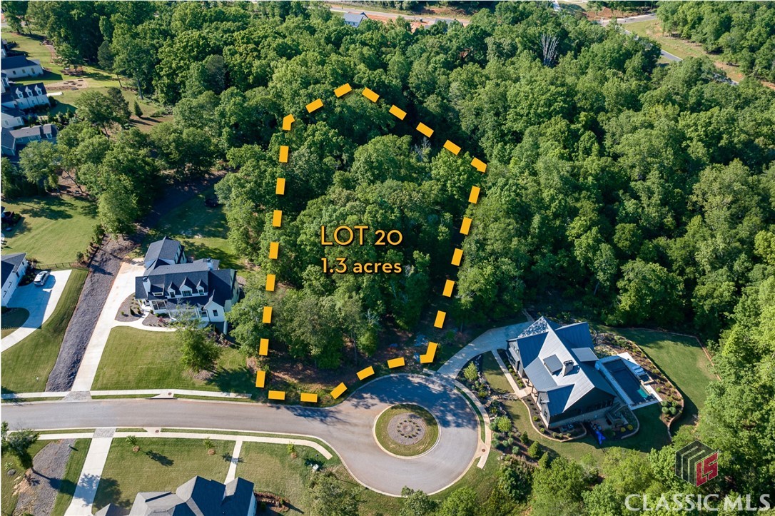 Fantastic opportunity to build your dream home in Spartan Estates! 1365 Ryan Pass is a spacious basement lot located on a quiet street in one of Athens’ most desirable neighborhoods. The lot features a 10-foot drop from left to right across the front, allowing for a daylight basement on the right side and a walkout backyard from the main level — perfect for adding a pool and outdoor living spaces. A 4-bedroom home with a media room has already been approved by the county. Spartan Estates is an established community with elegant homes, an active HOA, and convenient access to Hwy 129, Hwy 441, Loop 10, and downtown Athens. Utilities are available, and architectural guidelines are in place to protect your investment. Bring your builder and your vision — opportunities like this are rare in such a prime location.