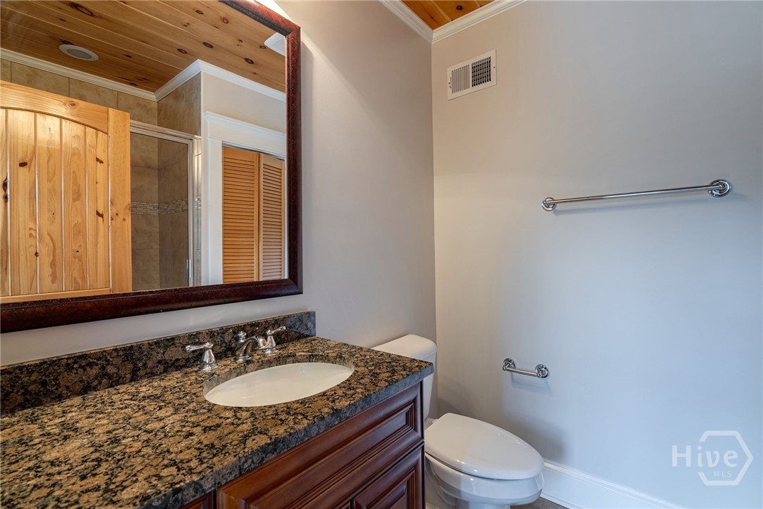 full bathroom next to sunroom