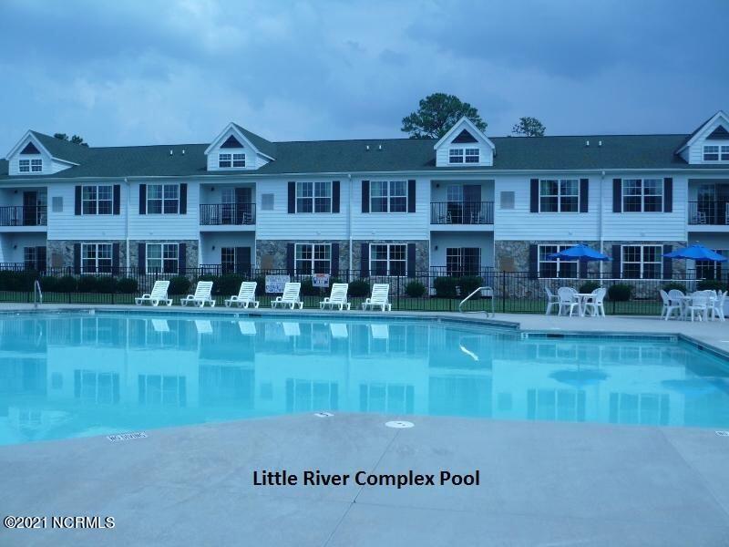 Exterior photo of 490 Little River Farm Boulevard A 203, Carthage, NC 28327. MLS: 100589208