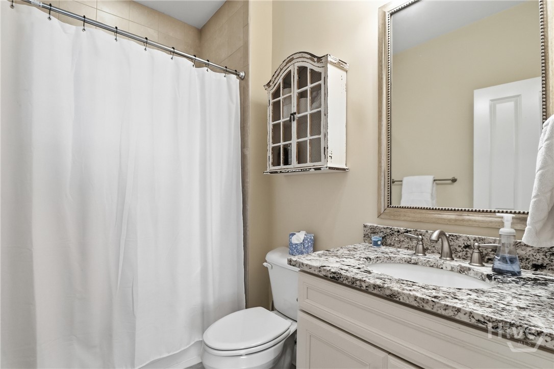 Bath for 2nd bedroom and guests in the hallway.