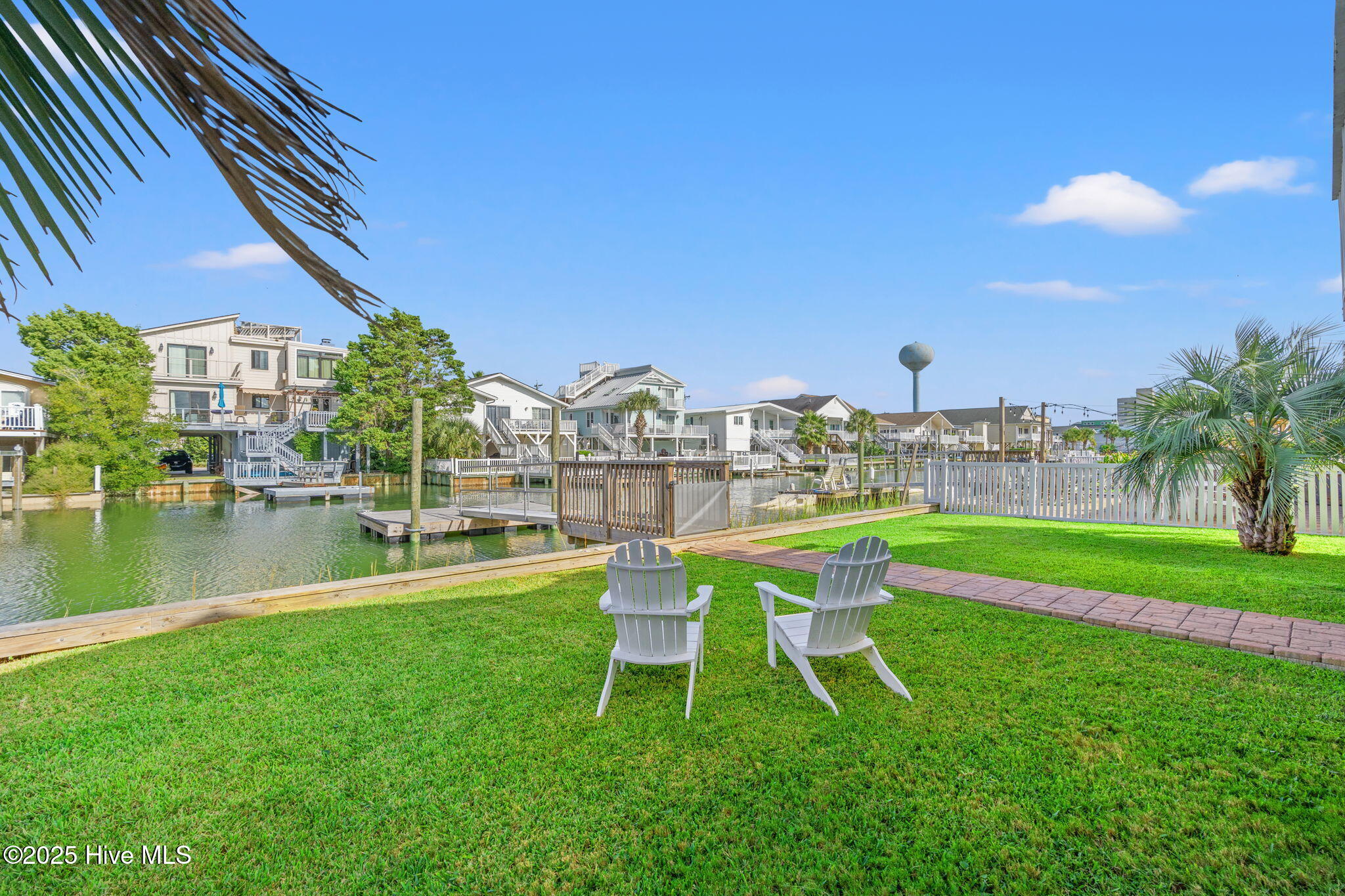 Immaculate rear yard facing canal