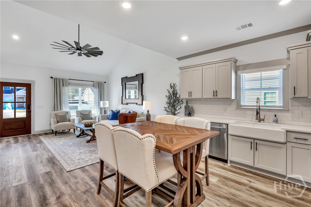 PHOTOS OF A PREVIOUSLY BUILT BRINSON PLAN BY LAWRENCE ALEXANDER HOMES.