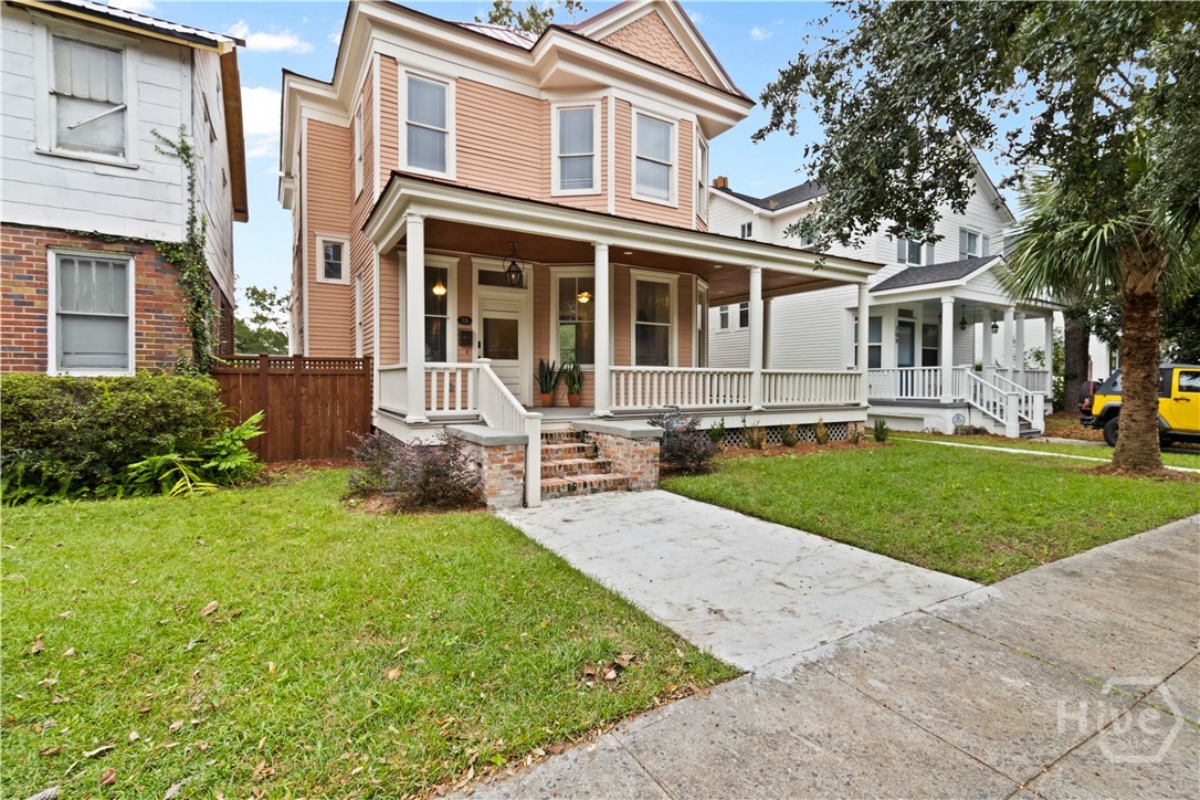 Porch perfect for sipping sweet tea and welcoming