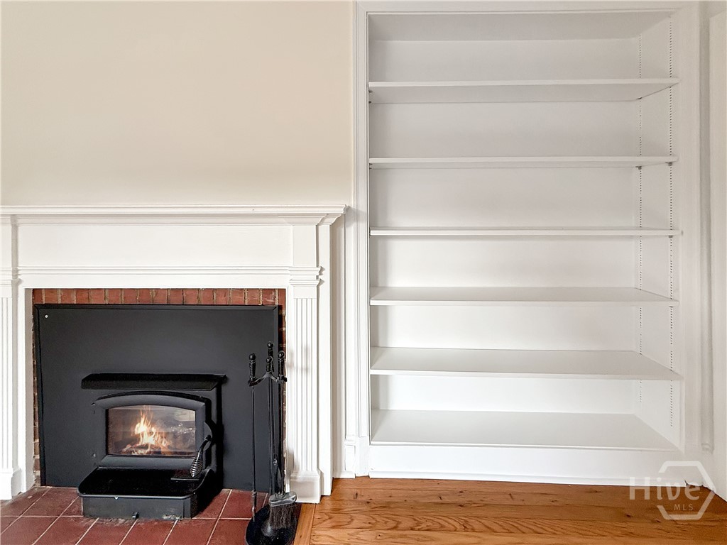 Great Room with Fireplace and Built-In Shelving