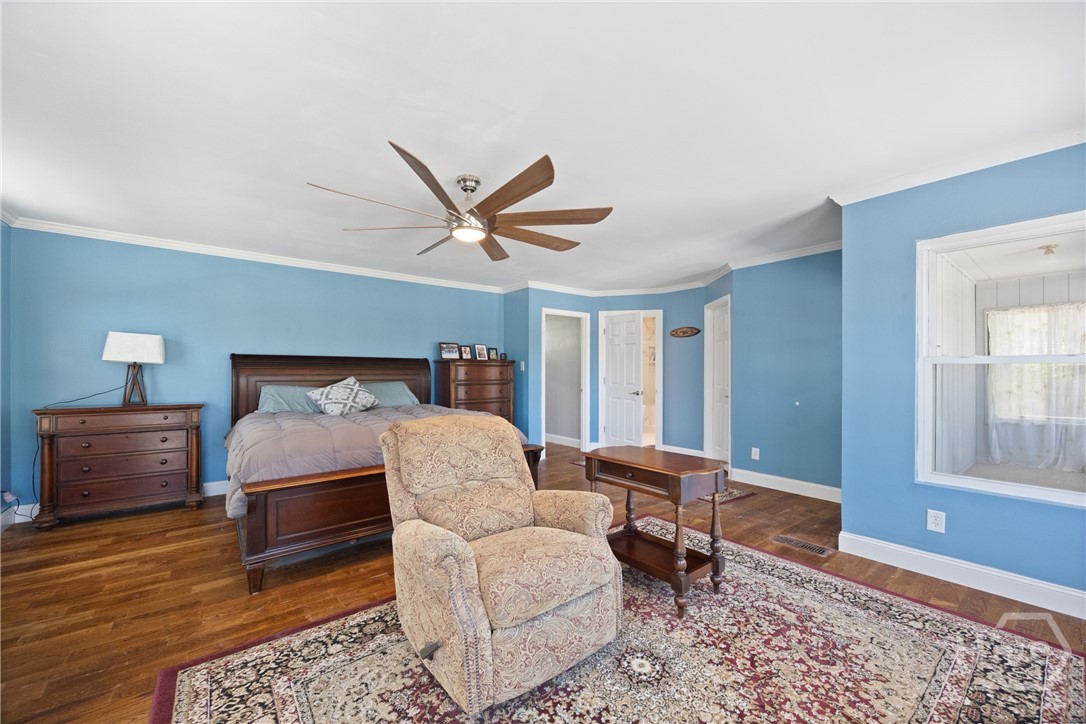 Alternate view of the primary bedroom, highlightin