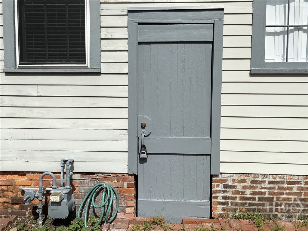 Door to alley/storage and emergency exit