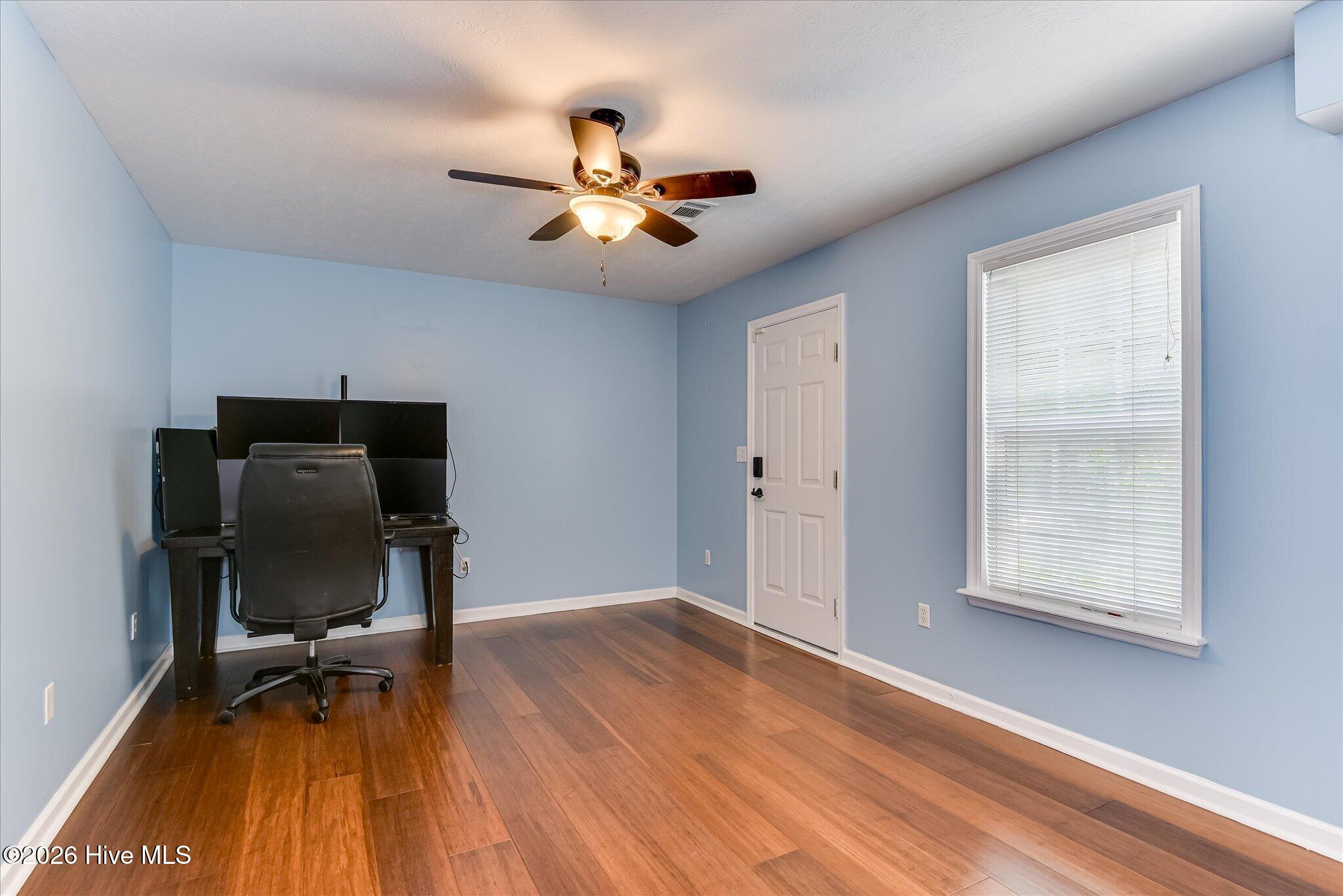 Guest or In Law Suite has a private outside entrance near the Garage. Wood floors just like the rest of the home.