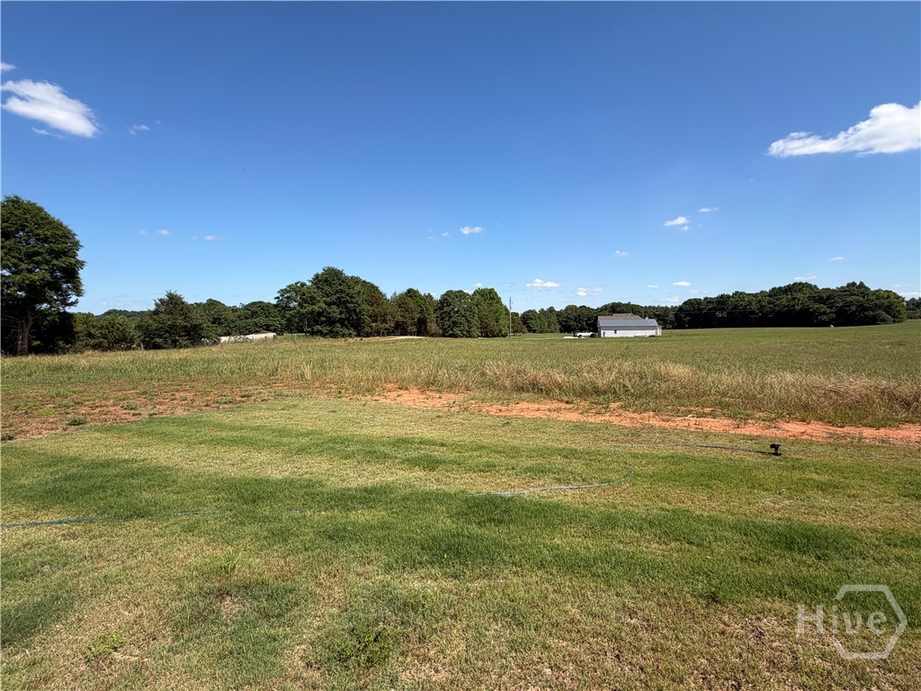 Open Field to Left of Home