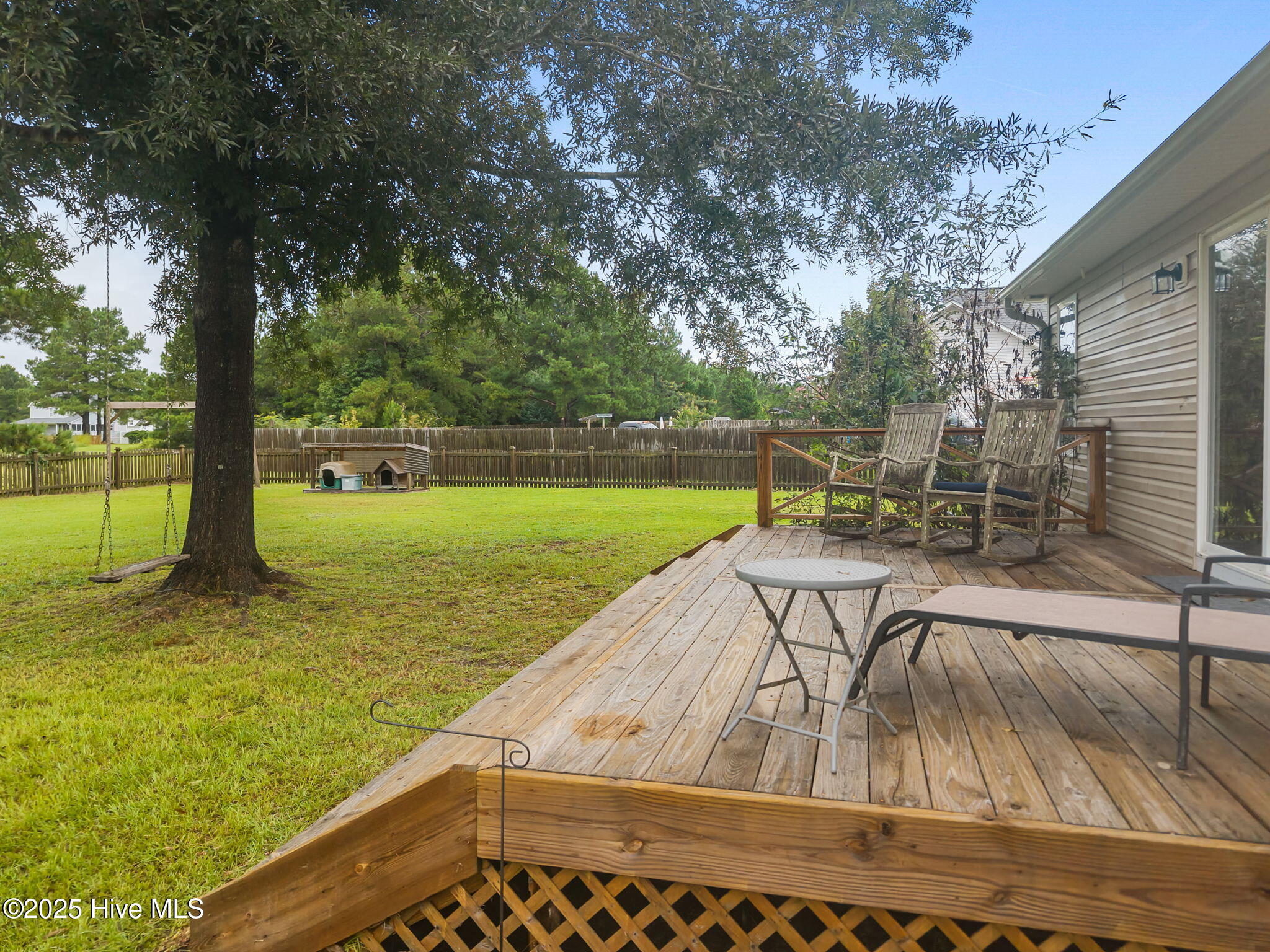 313 Oakmont Drive, Hampstead, NC 28443 – photo 10: 10-web-or-mls-DJI_20250811101349_0201_D