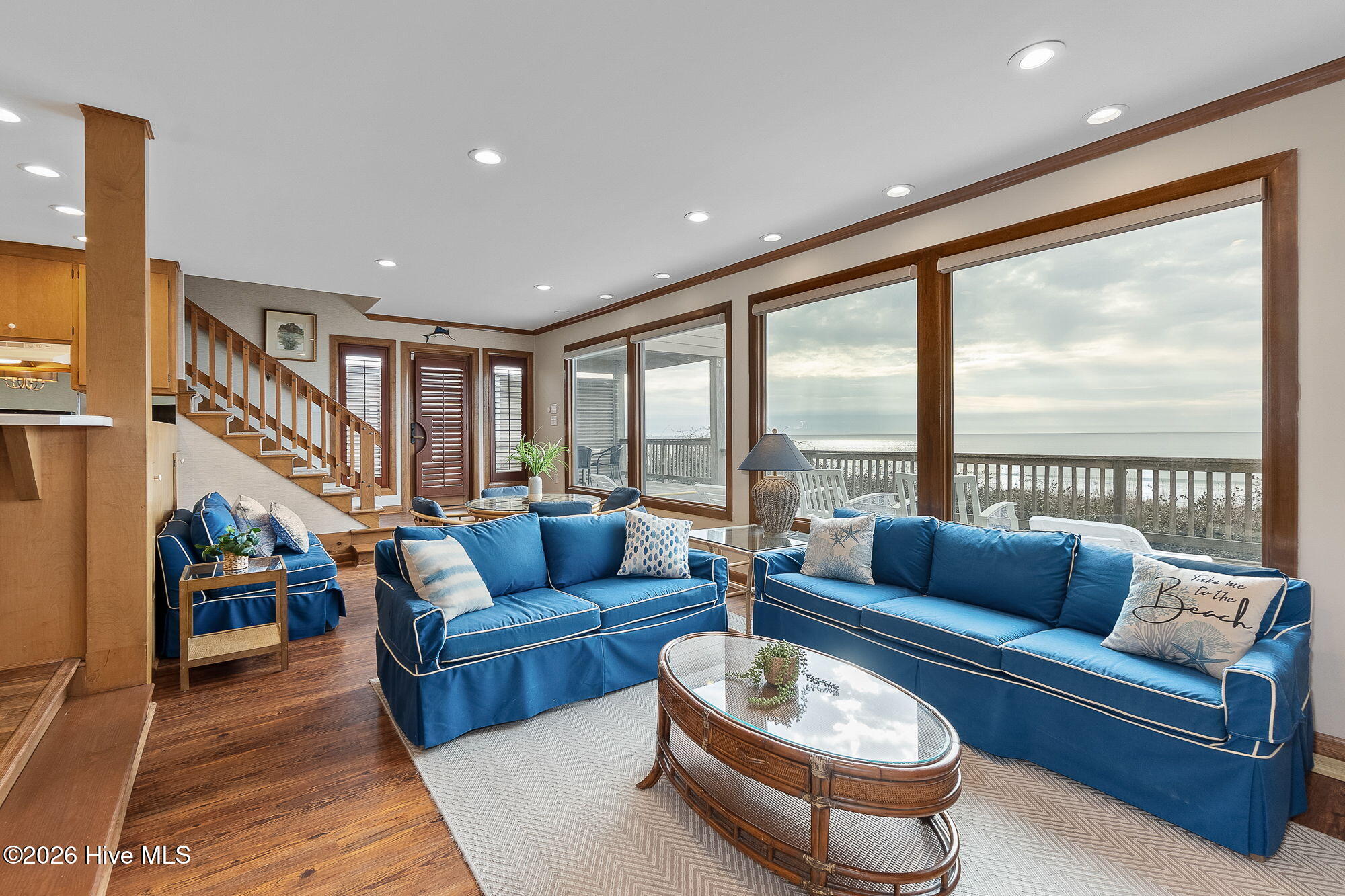 with patio access to the beach