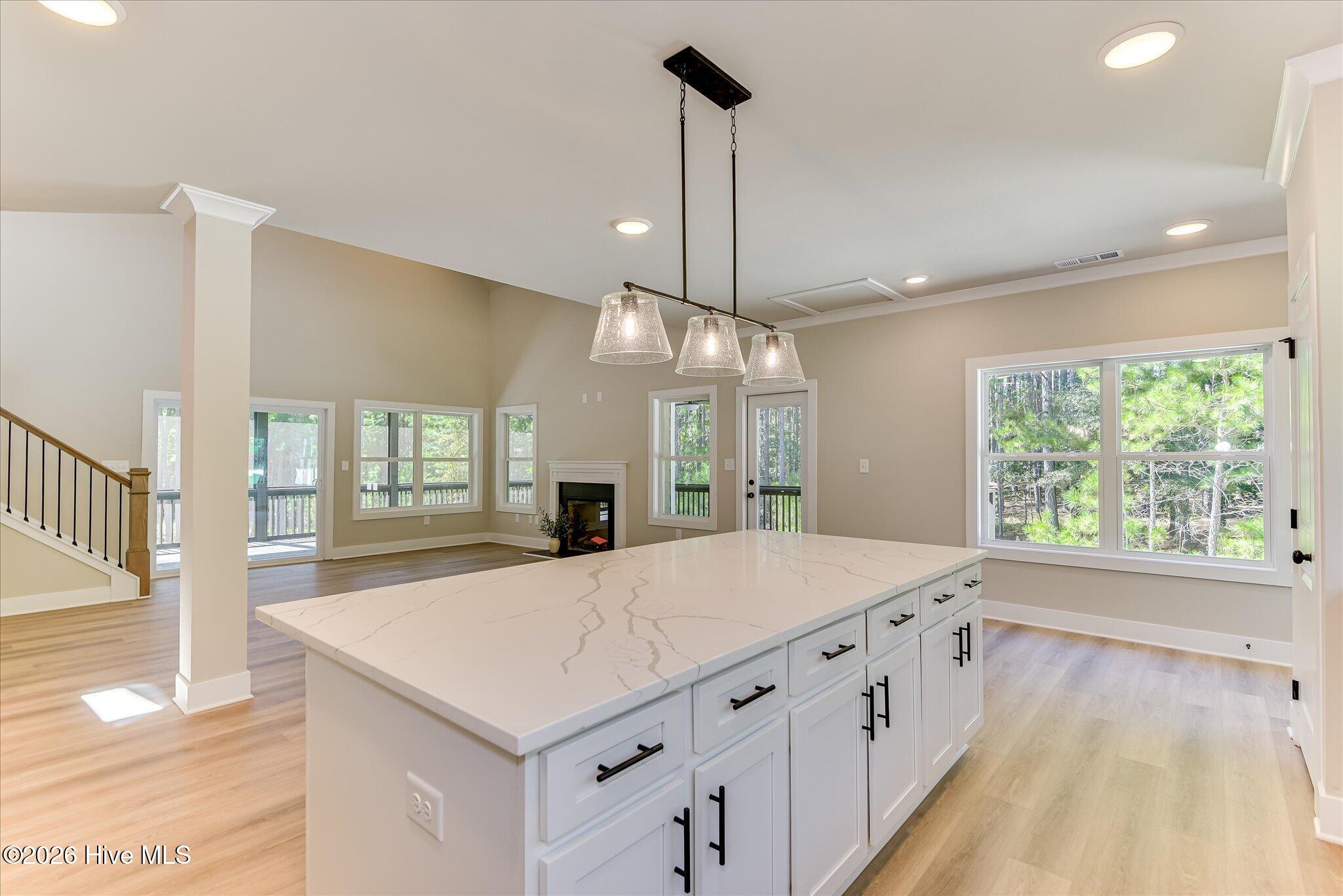 Oversized quartz island with lots of storage.