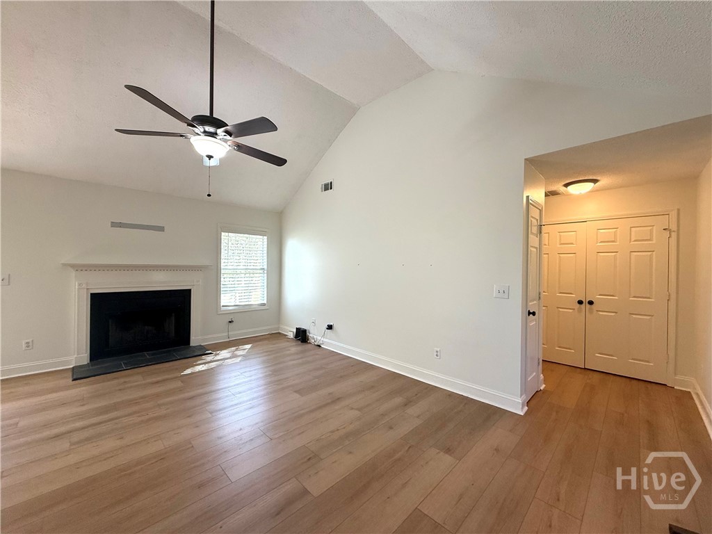 VIEW OF LIVING ROOM TO LAUNDRY CLOSET