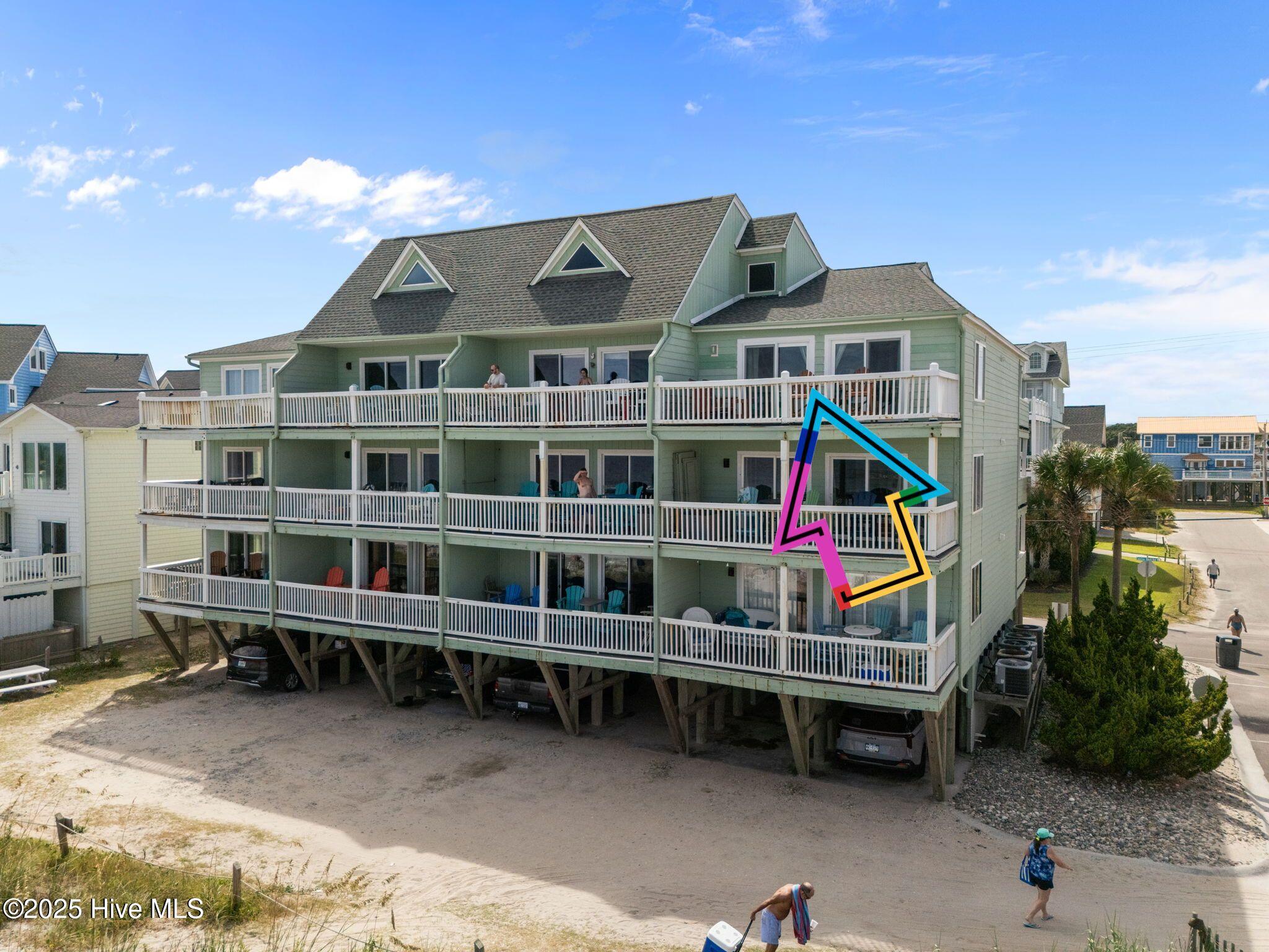 1518 Carolina Beach Avenue N D9, Carolina Beach, NC 28428 – photo 3: condo with arrow