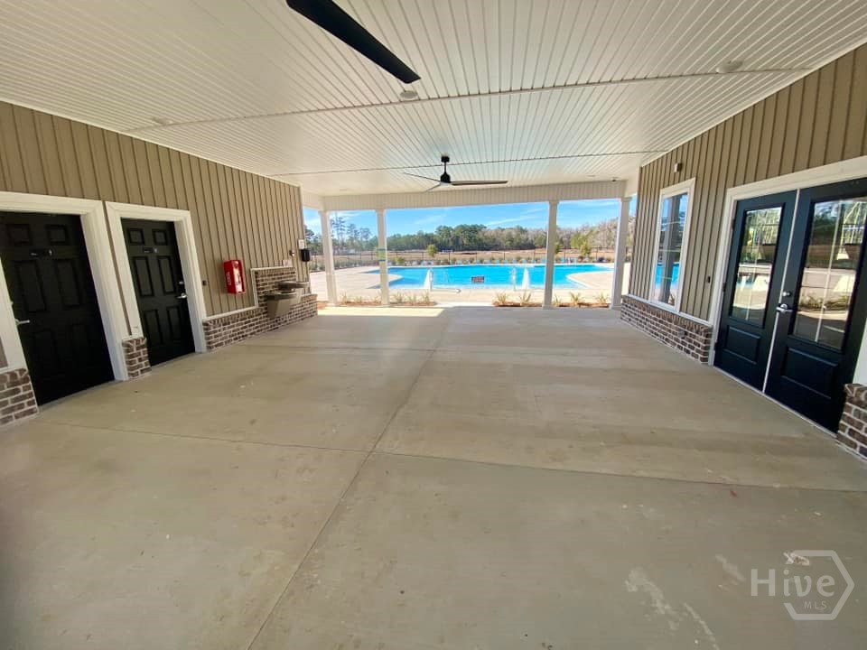 Community pool area - pavilion w / bathrooms and fitness room.