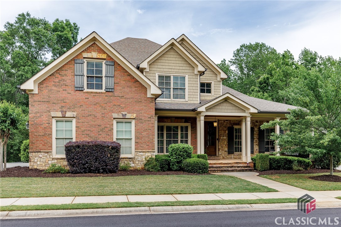 Have your cake and eat it too! How about Oconee's most desired pool and tennis community without the hefty price tag? Want that secluded, get-away-from-it-all vibe while still being minutes away from Epps Bridge shopping? Let's check out 1021 Westminster! How about timeless, stately homes with lush, mature landscaping without the bleak new-build blues? The best schools in the area without the tuition bill? Clubhouse living without the country club membership? Rowan Oak is for you! Ok you're listening...What about the house? With six bedrooms, five bathrooms and a finished basement suite this home is ready for anything. Let's take a little tour! How about starting with a lounge on the oversized front porch swing where you might enjoy the neighborhood vibes a little longer than you should before entering the soaring, light-filled foyer. Soak in the warmth of the living room's coffered ceiling and stacked stone hearth before swinging into the open plan kitchen with natural stone counters, a stylish herringbone backsplash, and an adjoining butler's pantry/mudroom that makes unloading from the two-car garage a breeze. The eat-in dining area that leads to the rear deck would be perfect for that giant farm table while the separate formal dining room would be a great place to park that heirloom dining set for special occasions. Once the party gets too loud you can escape to the stately primary bedroom on the main floor featuring a spacious private bathroom flanked by dual walk-in closets. Check out the inspiring views through the picture window above the tub before a luxurious soak or some me time in the beautifully tiled shower. Once you're cleaned up, make your way up the classy hardwood staircase and choose from the four bedrooms. Two are connected with a Jack ‘n’ Jill full bath, while a third connects to a full bath which also serves the common landing area. Bring all those nicknacks 'cause you're gonna need to put something in all the attic storage spaces available up here. Heading back down to below the main level, the walk-out finished basement is a world of its own. The central room at the landing would make a great media center for game days or movie nights. Continuing through a small hallway we find a beautiful room with a tray ceiling, accent wall and walk-in closet that will certainly impress the guests that will be staying in your new palace. Let's not forget to check out the double-windowed, oversized bedroom and 3 separate basement areas for storage, hobbies, or future finishing out. Wow. This house? In this community? At this price? Wait, did you notice the beautiful fountain at the entry gate or the private walking trails? How about the pool, courts and playground at the clubhouse or the buffer of hardwoods that seclude the neighborhood from nearby roads? This place really has ALL the things. Have your cake and eat it too!