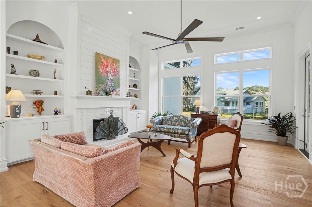 Family Room open to the Kitchen and Dining Area overlooking a stunning lagooon.