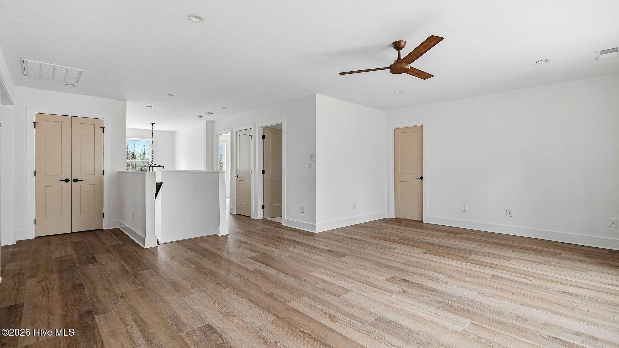 Additional finished walk-in storage in loft upstairs