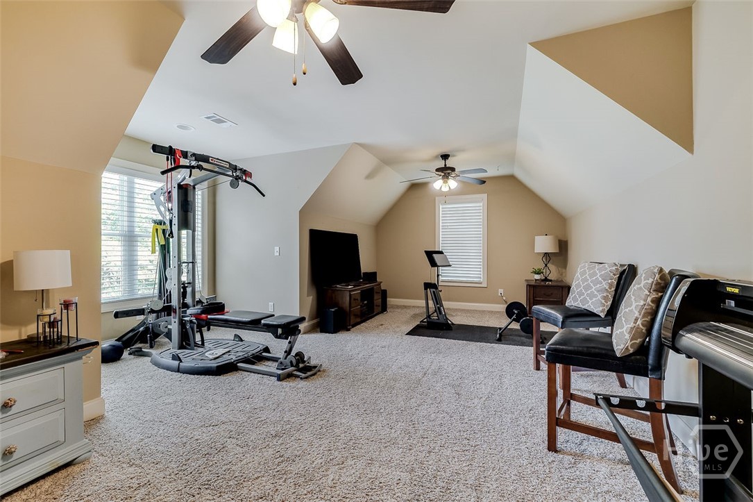 Guest bedroom #3 with large walk-in closet.  Can also be used as a bonus/workout/office or flex room