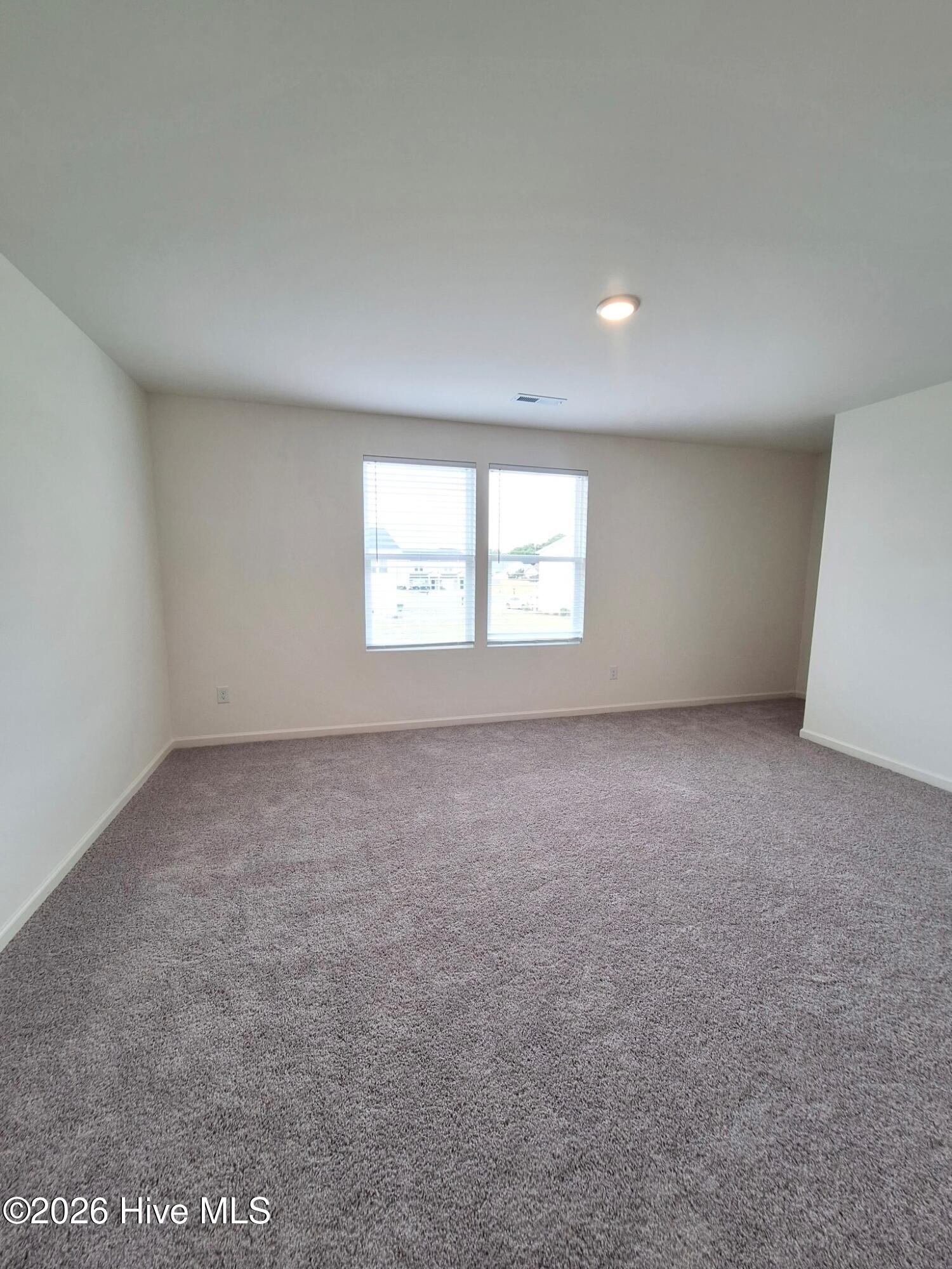 Exterior photo of 2425 Brookville Drive B, Greenville, NC 27834. MLS: 100582055