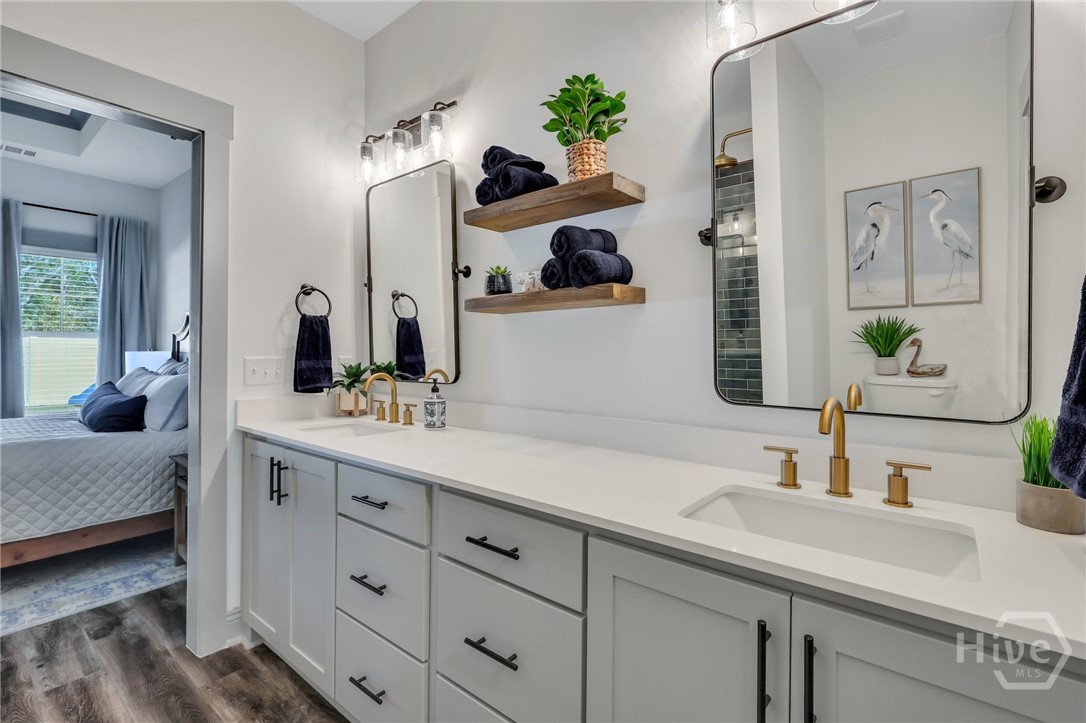 PHOTOS OF A PREVIOUSLY BUILT BRINSON PLAN BY LAWRENCE ALEXANDER HOMES.