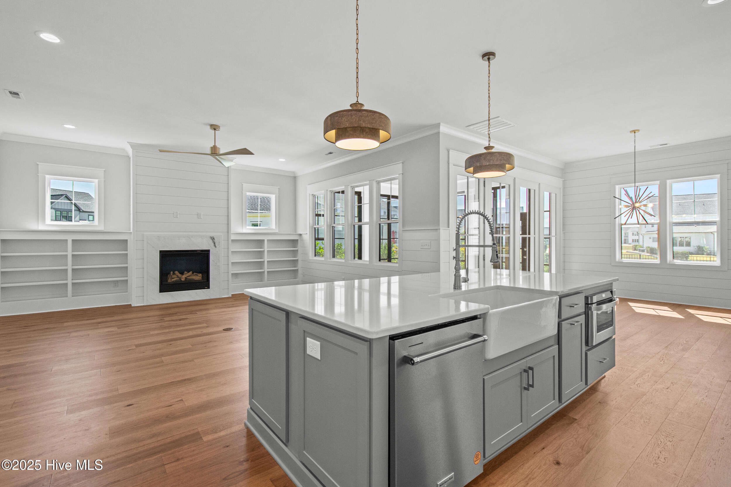 Kitchen opening to living area