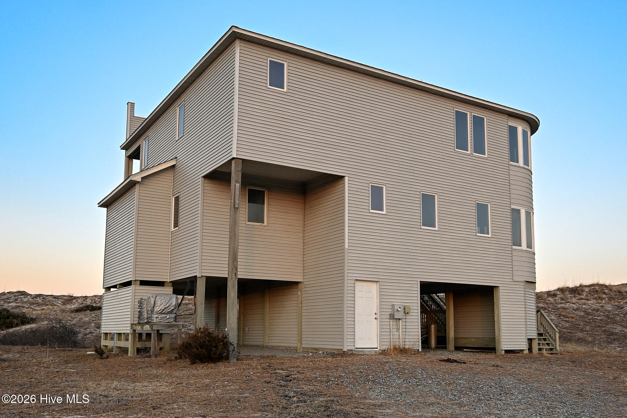 Front Elevation, Sunset View from Driveway