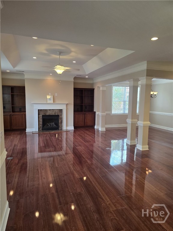 living area with dining area. Trey Ceiling