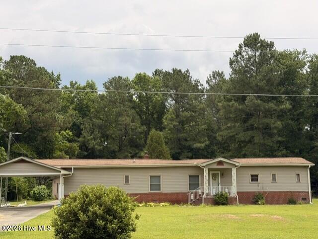 Exterior photo of 323 Pierce Road, Hallsboro, NC 28442. MLS: 100583806