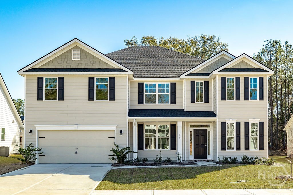 The Gwinnett plan by Smith Family Homes is under construction in Ramsey Landing with an estimated completion date of October 2026. This 4,161 square foot home features an open kitchen and living area, formal dining room, office/flex space, and secondary bedroom with full bathroom on the first floor. Upstairs is a spacious primary suite that includes a sitting area, two walk-in closets, a soaking tub, and walk-in shower. Three additional bedrooms are located upstairs. Included are stainless steel appliances (dishwasher, microwave, oven), LVP in the common areas downstairs, granite/quartz countertops. Stock photos shown; to be similar but not identical.