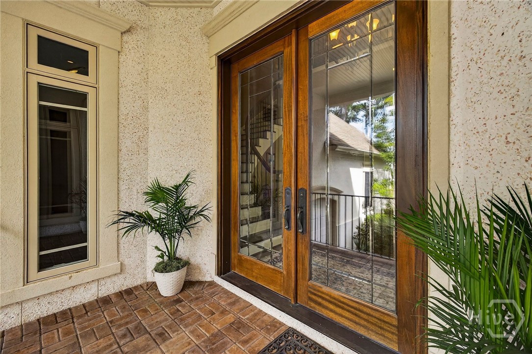 Double Glass doors bathe the home in a natural lig