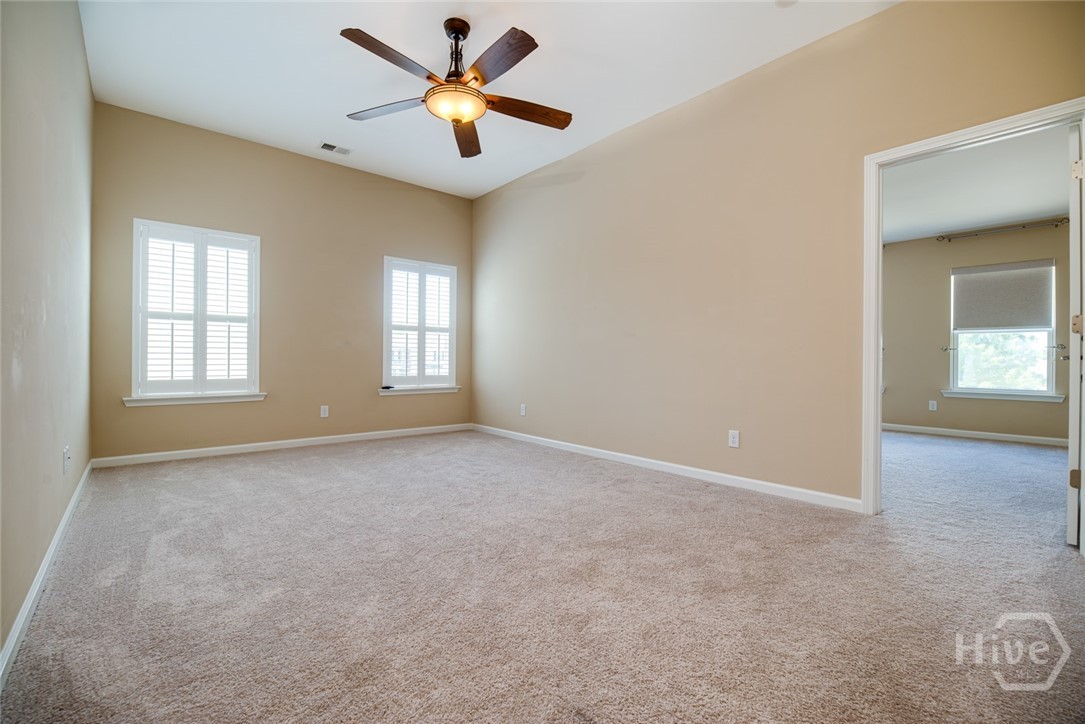 Loft area with custom plantation blinds