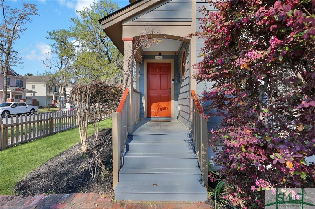 Front door faces Harmon