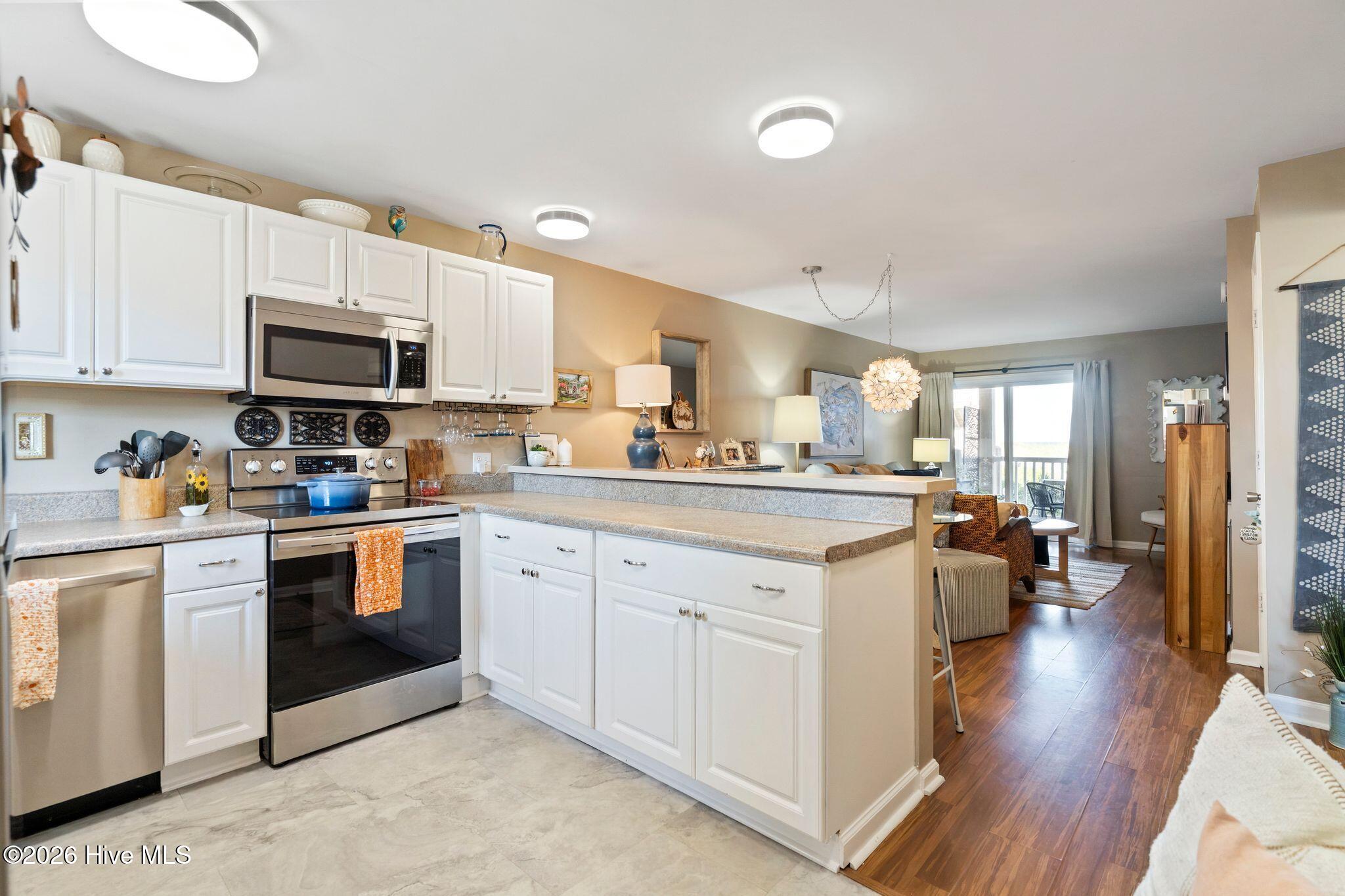 Photo 4 of Condo for sale at 1101 Lake Park Blvd S #C2, Carolina Beach, NC 28428 | MLS# 100606420 | Listing updated on 2026-10-05