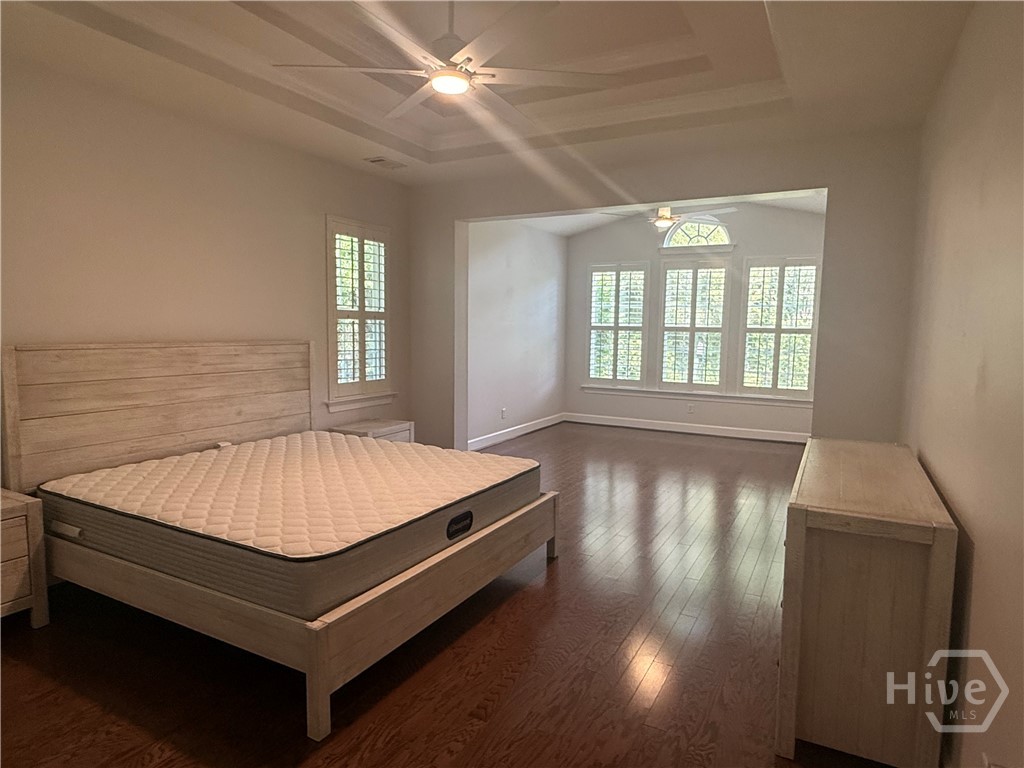 Primary with large seating area and door to lanai.