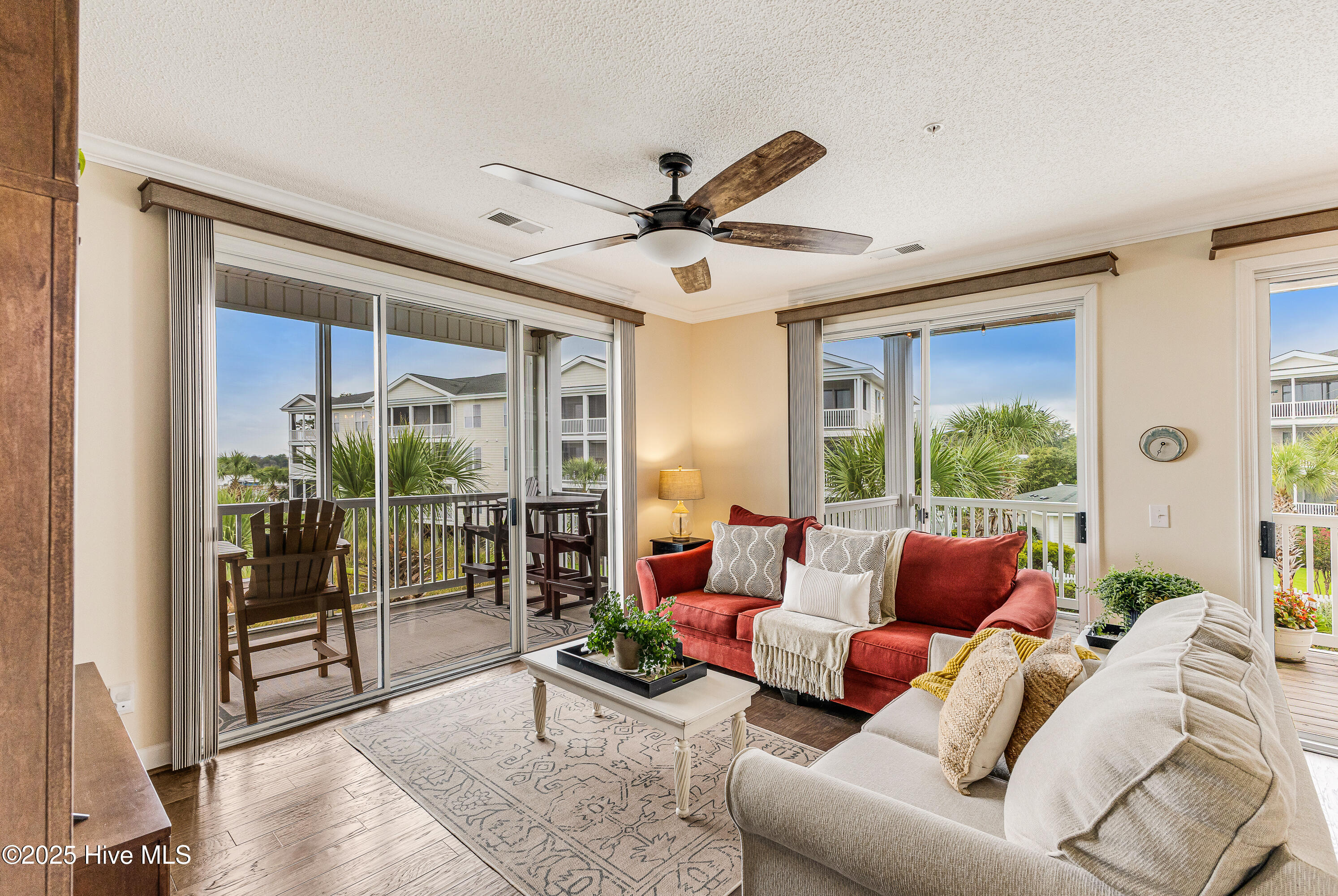 1135 Park Road SW Unit 4201, Sunset Beach, NC 28468 – photo 14: Almost a wll of windows!