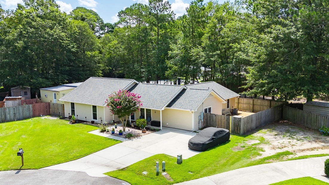 This home is surrounded by a mature tree buffer on the back side!