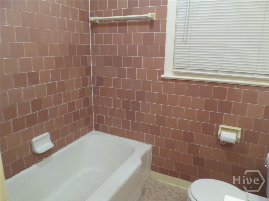 Tub with shower