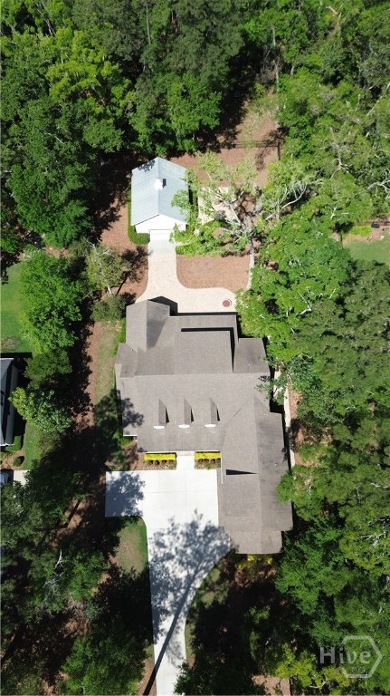 Front drone shot of the home and detached garage
