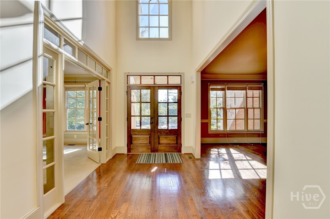 Soaring 2 story foyer