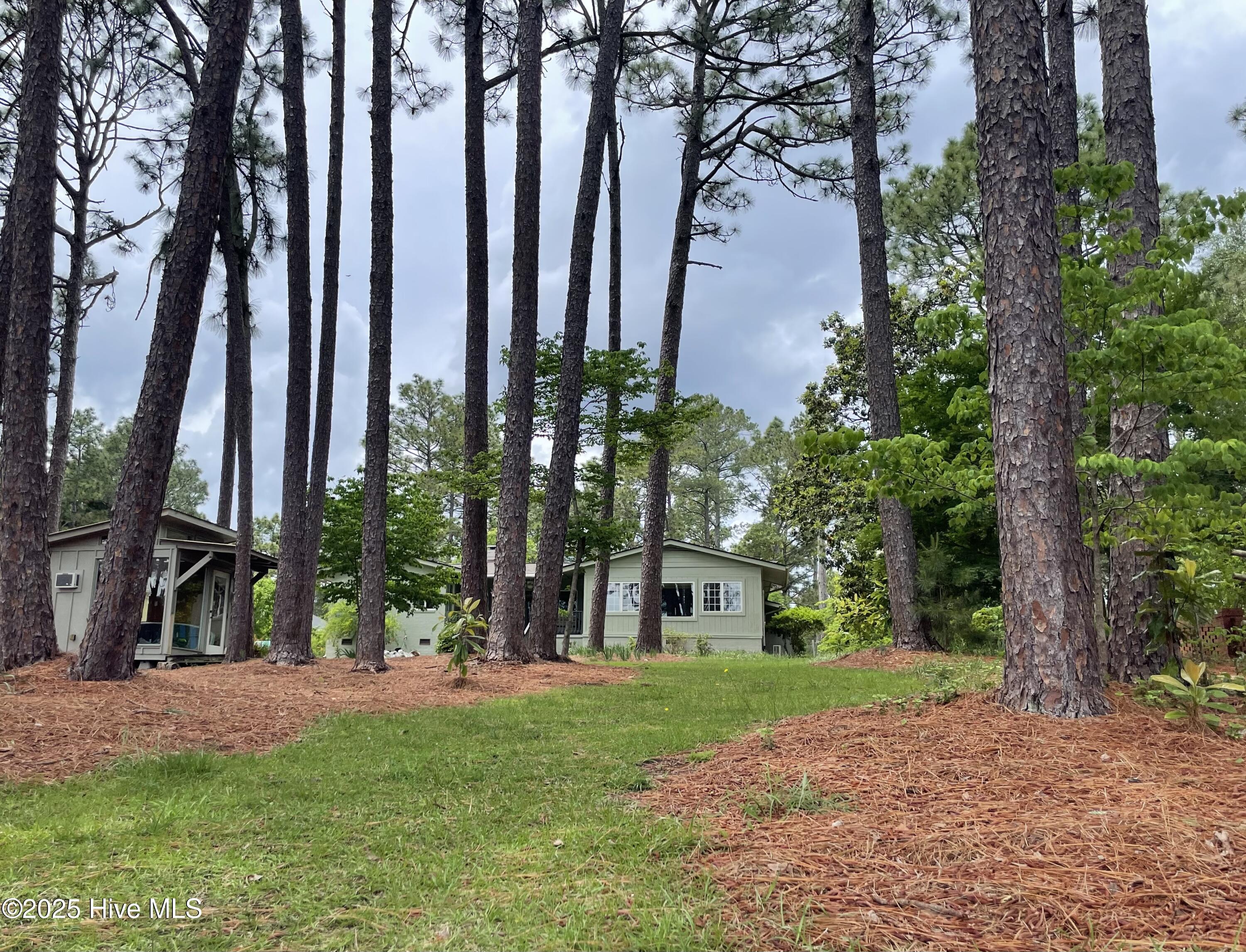 Exterior photo of 164 Pine Lake Drive, Whispering Pines, NC 28327. MLS: 100578883