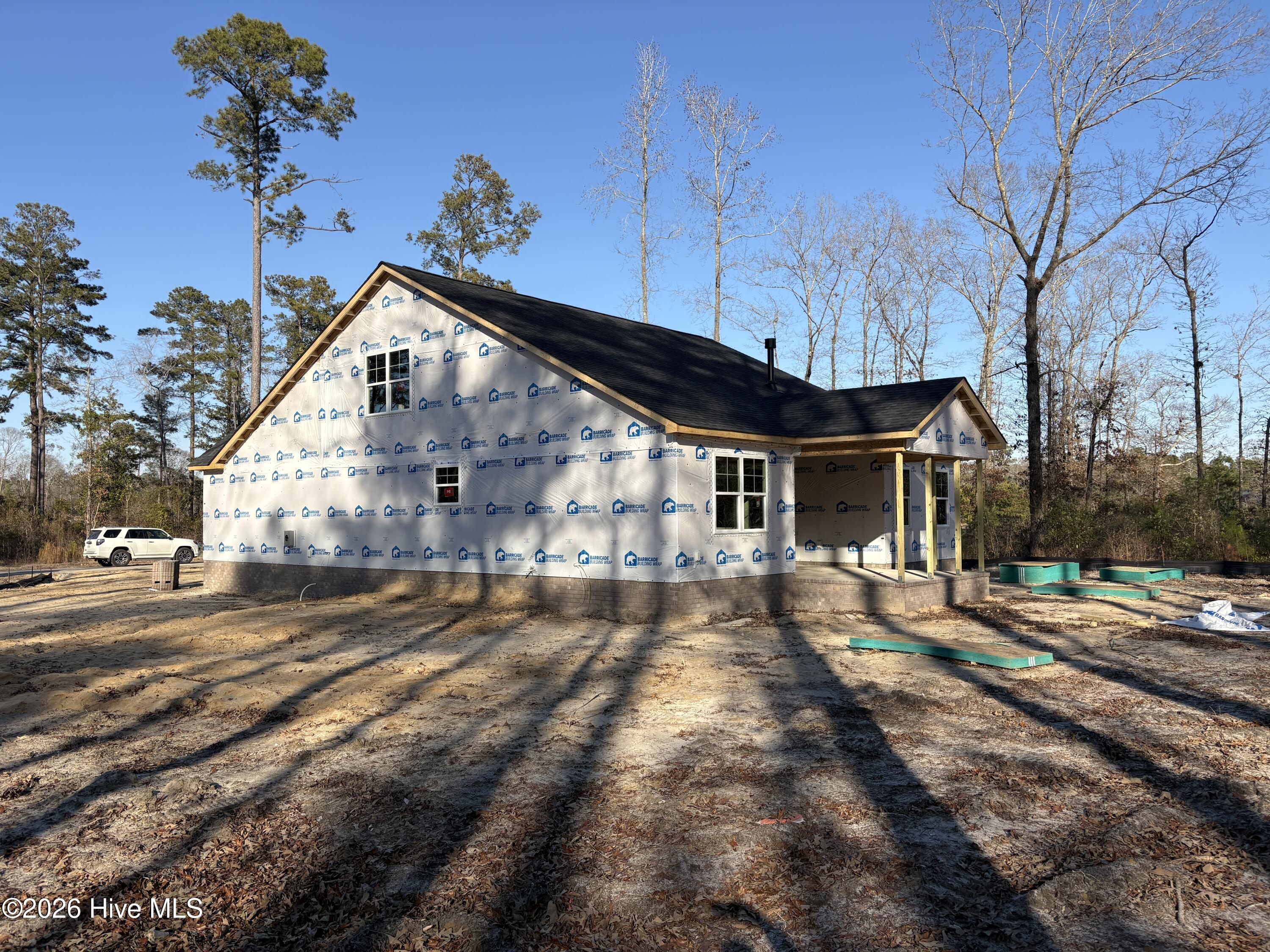 View of the back. Screened Porch on this house