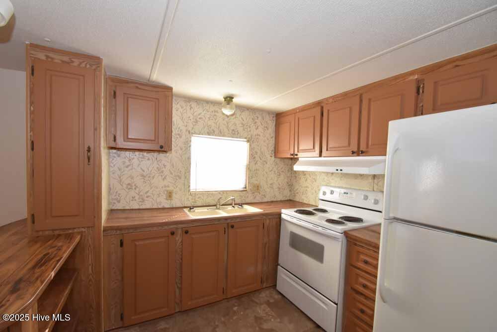 Exterior photo of 1411 Diamond Lane, Greenville, NC 27834. MLS: 100580807