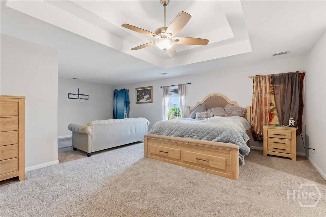 Primary bedroom with sitting area
